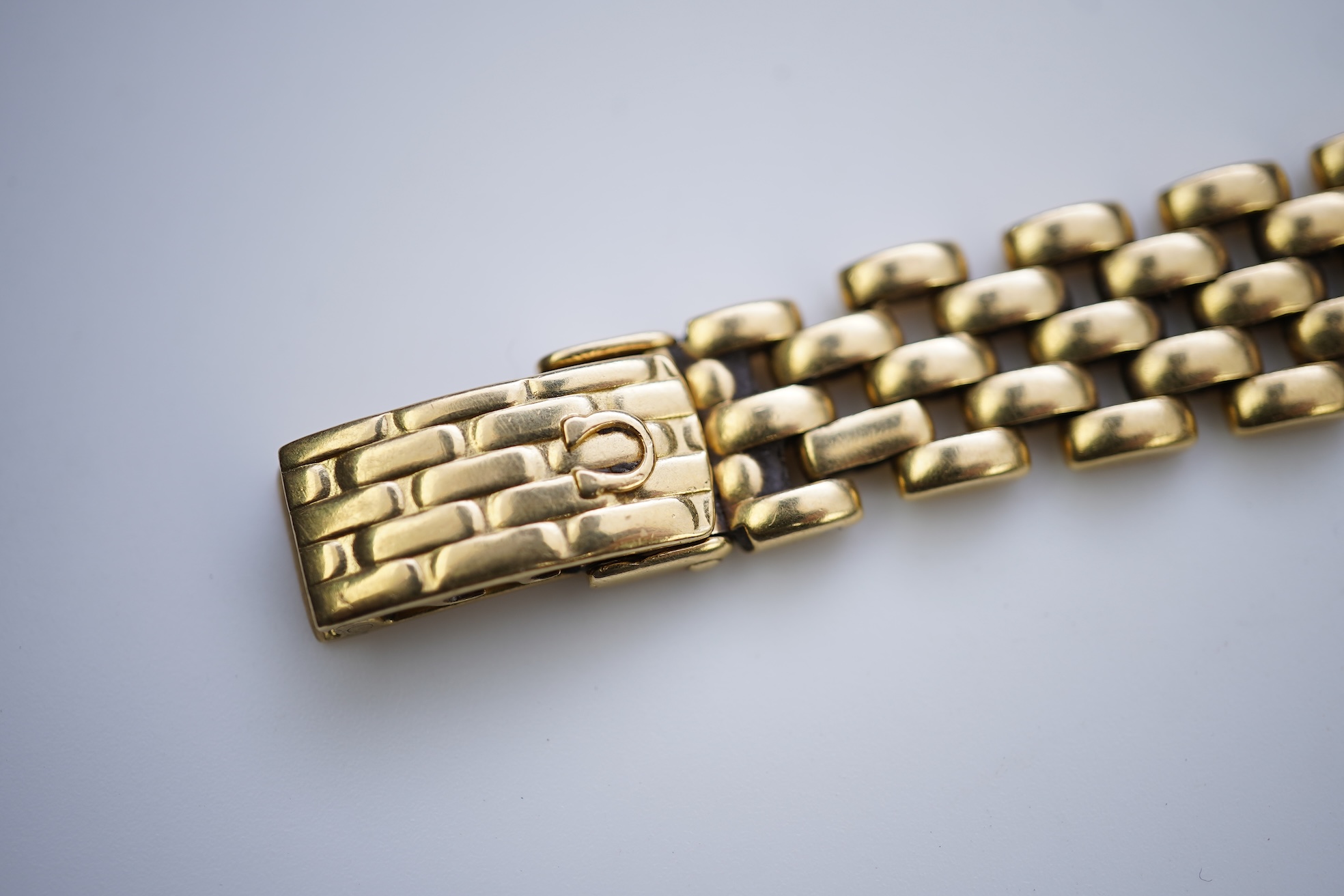Omega, a lady's 18ct gold and diamond 'De Ville' wristwatch